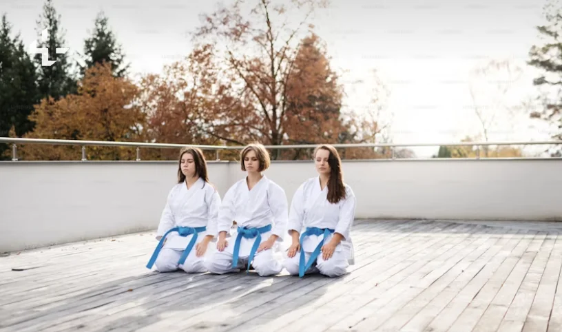 three-slender-young-girls-sit-in-a-yoga-poses